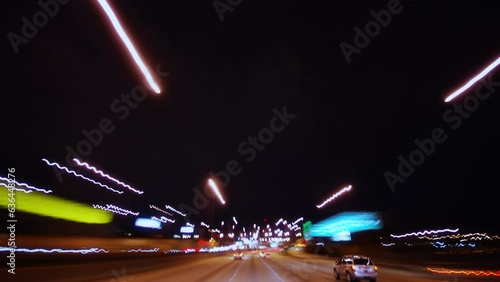 Driving at night timelapse footage with overhead lights