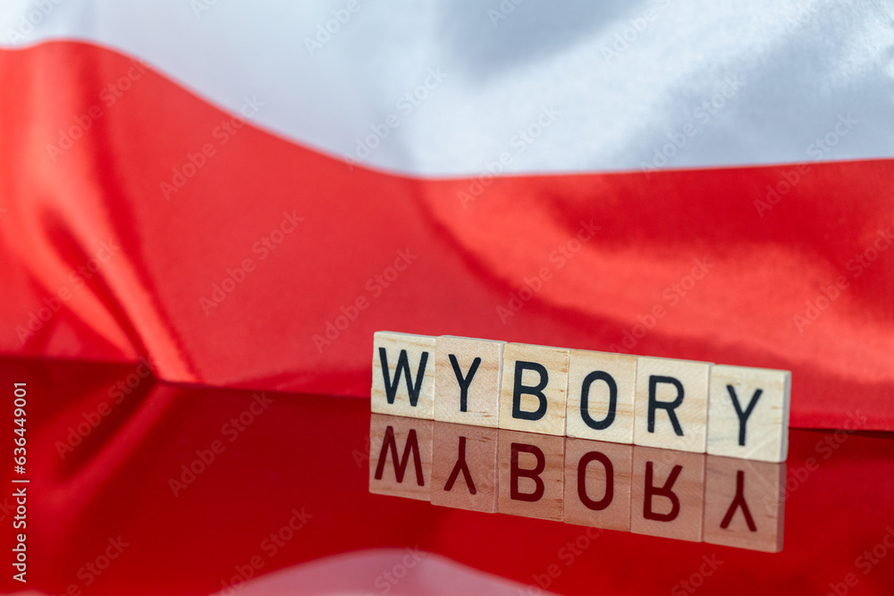Elections in Poland year 2023, Concept, White and red national banner encouraging to go to vote in parliamentary elections. the word WYBORY in Polish meaning Elections in English. - obrazy, fototapety, plakaty 