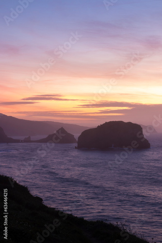 Basque Cliffside Magic: Evening at Gaztelugatxe Unveils Breathtaking Coastal Beauty and Tranquil Serenity © larrui