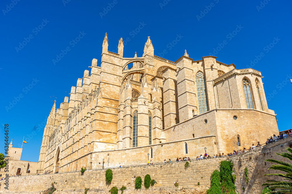 Experience the iconic Mallorca cathedral in all its exterior grandeur, capturing the essence of Spanish Gothic style and design