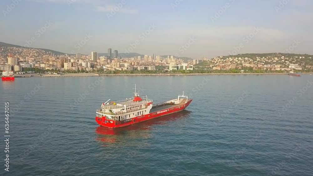A landing craft anchored 600 meters off the coast at Maltepe in Istanbul. Marmara Sea, Aerial Drone Camera tilts slightly down
A landing craft anchored 600 meters off the coast at Maltepe in Istanbul. Marmara Sea, Aerial Drone Camera tilts slightly down