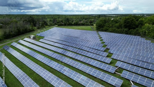 Wallpaper Mural Aerial Drone Shot of Solar Panel Renewable Energy Farm on Sunny Summer Day in Country Field Rural Canada Ontario Torontodigital.ca