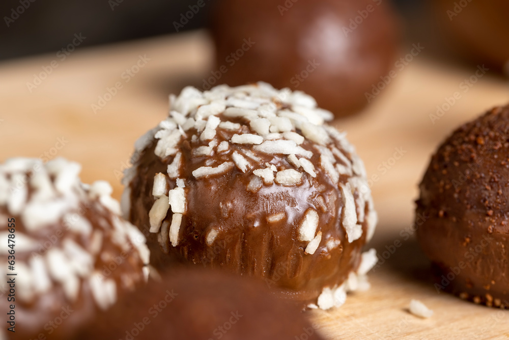 Chocolate candies with coconut flavor and filling Chocolate candies with coconut flavor and filling