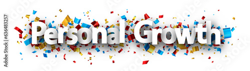 Personal growth sign over colorful cut out foil ribbon confetti background.