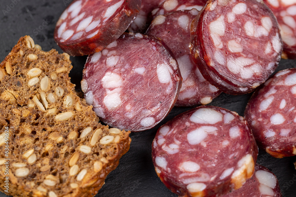 sliced high-quality pork sausage with the addition of lard pieces sliced high-quality pork sausage with the addition of lard pieces