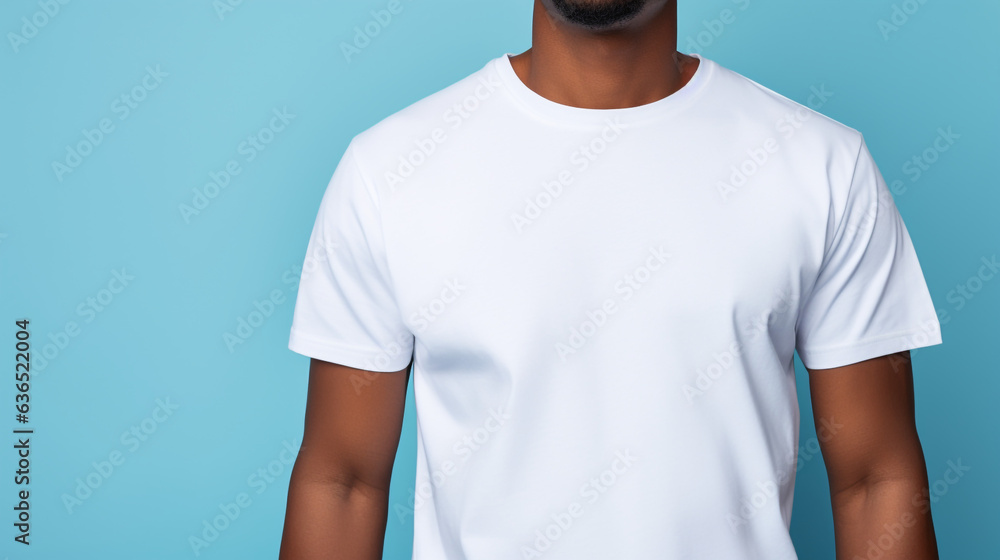 a young man confidently modeling a Bella Canvas white shirt mockup against a serene blue background. a young man confidently modeling a Bella Canvas white shirt mockup against a serene blue background.