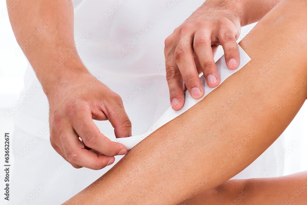 Obraz premium Beautician Waxing Woman's Leg