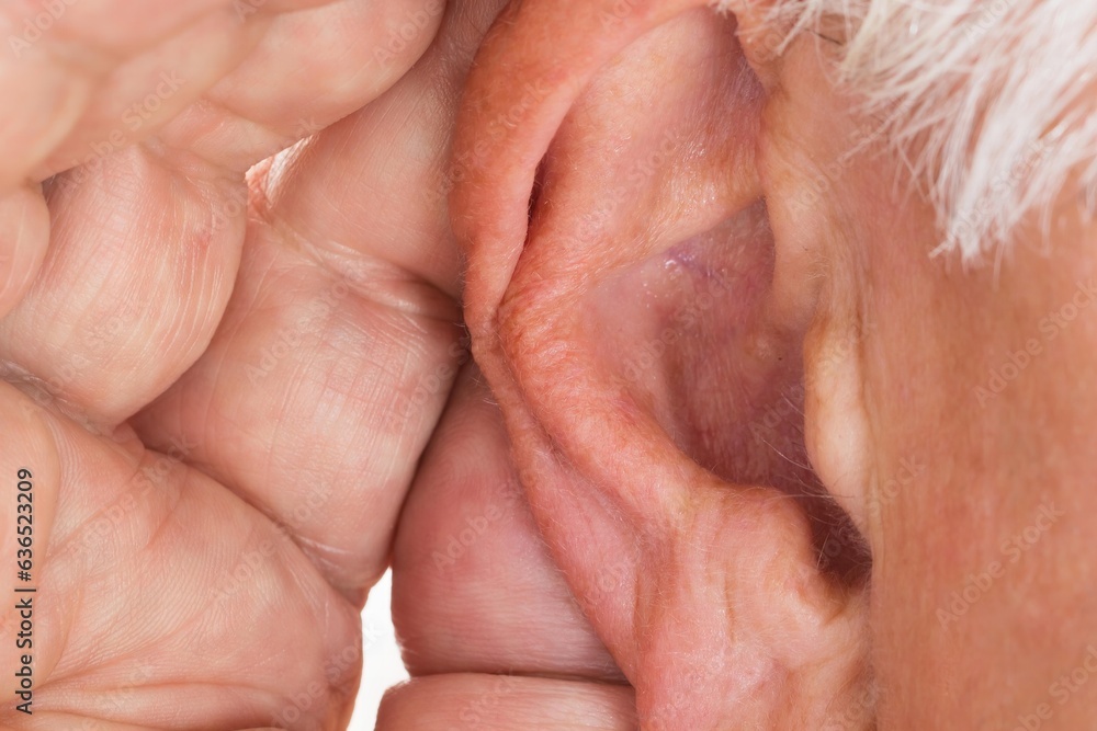Close-up Of A Man Trying To Hear Close-up Of A Man Trying To Hear