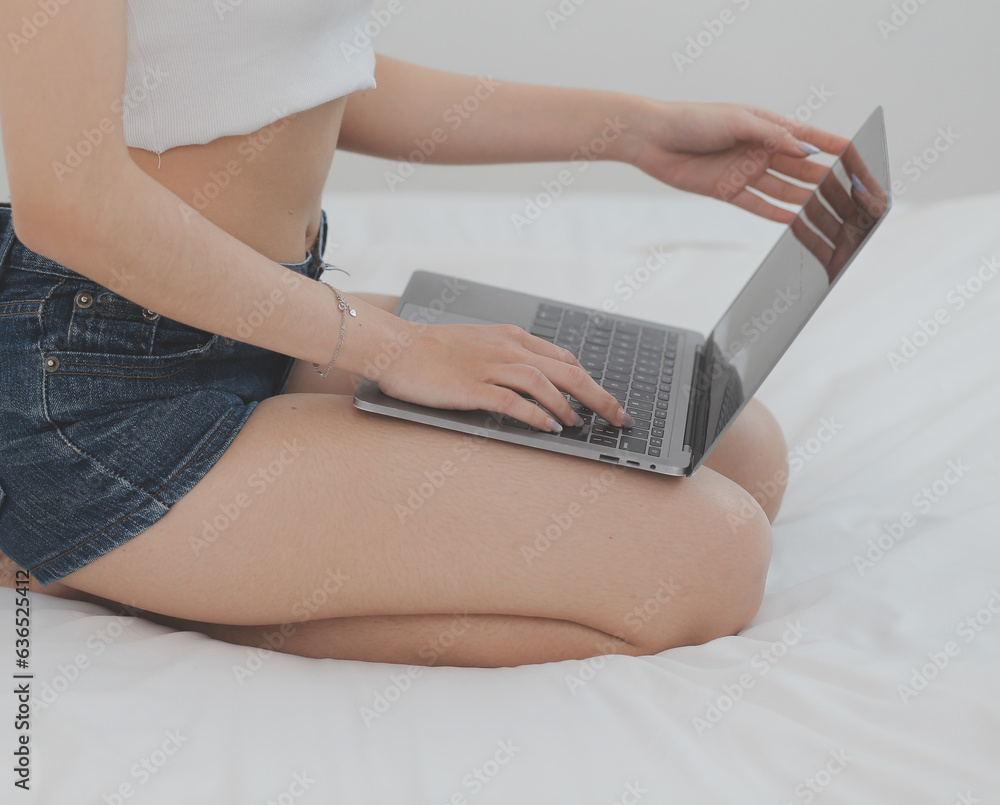 Naklejka premium Young attractive girl Spanish appearance delighted with the surprise. And The Morning Started With An Unexpected Healthy Breakfast. In surprise, she waved her hands and rejoices at what is happening.