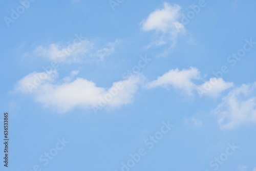 beautiful blue sky and white fluffy cloud with sunrise in the morning, natural background