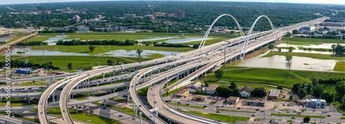 Urban Dynamics: Aerial 4K Image of Dallas Texas Traffic on Busy Roads with Flooded Trinity River