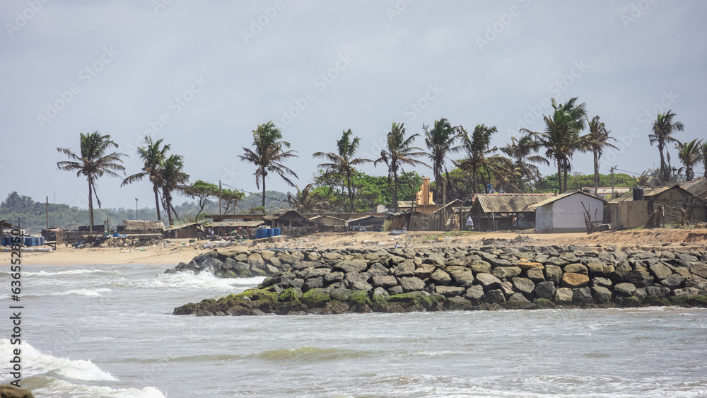 A rural coastal village with poor people living in a harsh environment for fishing industry. A rural coastal village with poor people living in a harsh environment for fishing industry.