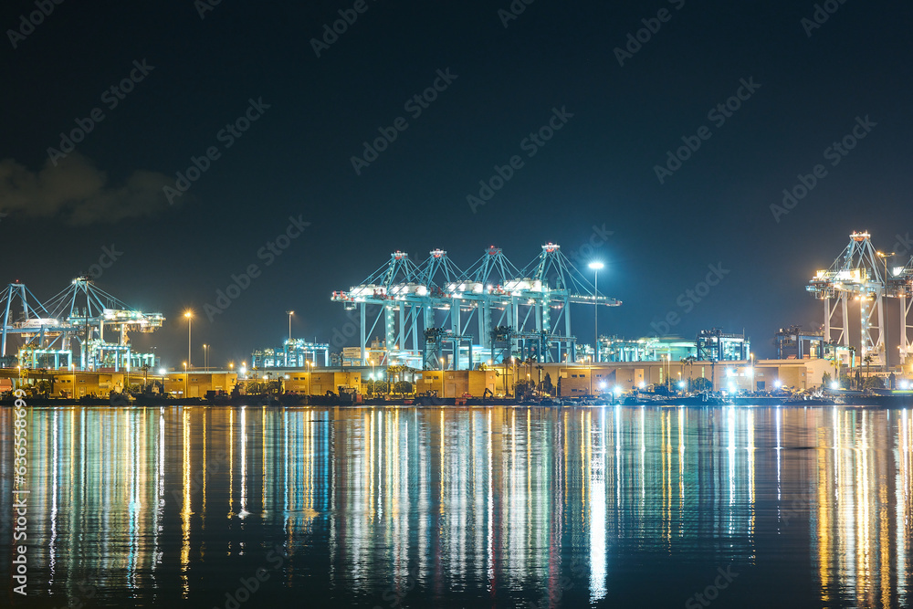 cranes in port at night in Algeciras Spain