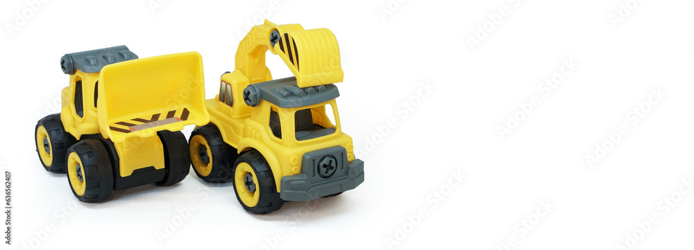 yellow plastic truck and bulldozer toy isolated on white background with copy space for text or banner yellow plastic truck and bulldozer toy isolated on white background with copy space for text or banner