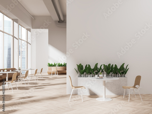 White restaurant interior with sofas and windows © ImageFlow