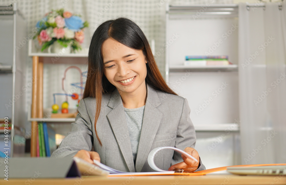 happy business woman working Because the work has reached its goal happy business woman working Because the work has reached its goal