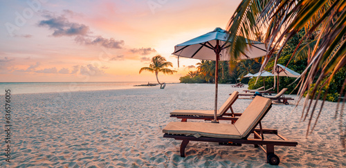 Fototapeta Naklejka Na Ścianę i Meble -  Romantic beach holiday, love couple destination scenic, chairs beds under umbrella, coco palm leaves. Exotic travel coast landscape. Panoramic island paradise vacation. Colorful sea sky, closeup sand