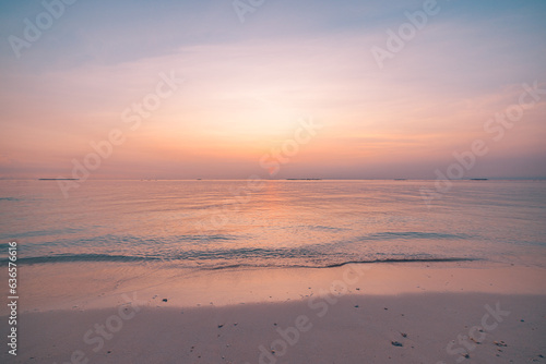 Peaceful tranquil sunset beach closeup. Abstract beach inspire motivation colorful sky calm waves horizon. Sea bay clouds. Idyllic summer seaside landscape. Mediterranean tropical relaxation coast