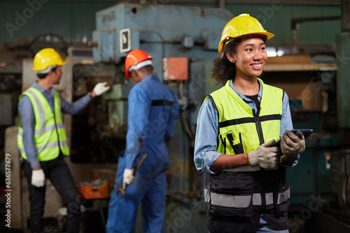 portrait worker or engineer working on tablet in the factory