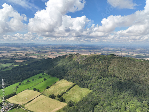 Aeriel drone view of a hill in england, set in green countryside in summer, wrekin in shropshire england photo