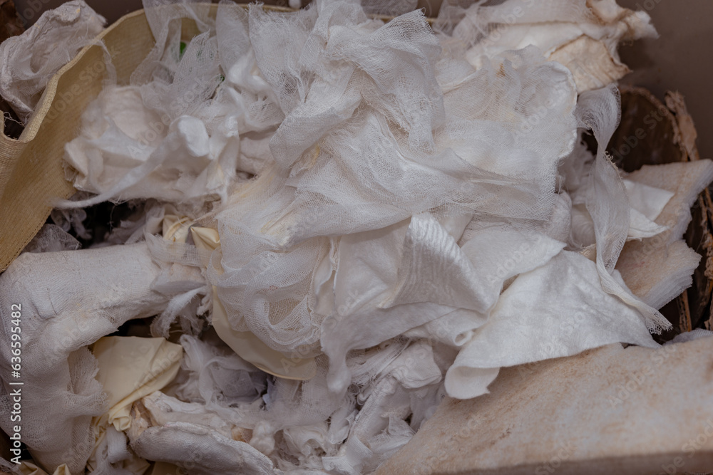 Overflowing Dustbin of Waste White Bandages Overflowing Dustbin of Waste White Bandages