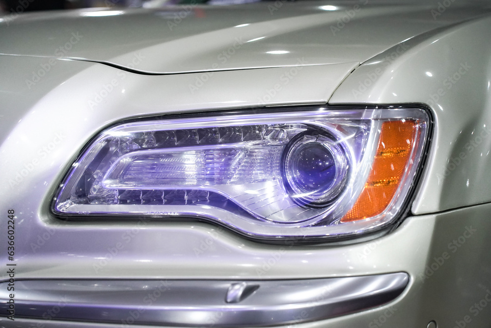 close up, modern silver car headlights