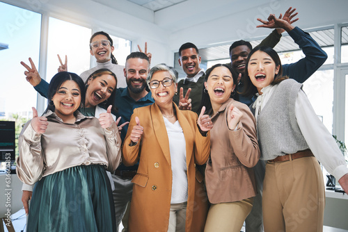 Business people, group celebration and wow, success and peace sign, thumbs up or friends in team building. Happy, excited and diversity women and men in office teamwork, support or thank you portrait