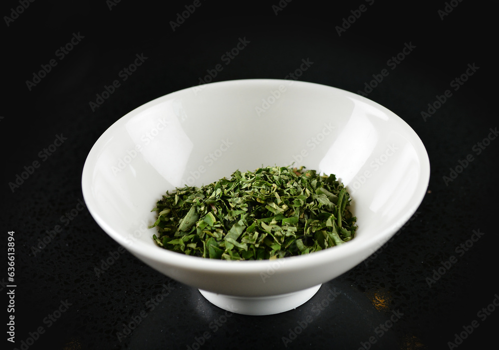 chef signature homemade spices curry green leaf matcha dry herb in bowl for laksa on black marble table asian halal food cuisine menu for restaurant chef signature homemade spices curry green leaf matcha dry herb in bowl for laksa on black marble table asian halal food cuisine menu for restaurant
