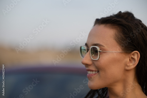 Portrait of stylish hipster woman - girl with colored glasses