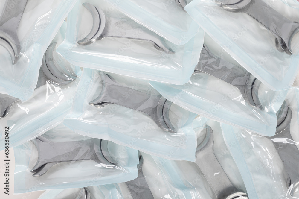 Metal dental retractors, autoclaved, cleaned, ready to use on a table at a clinic.