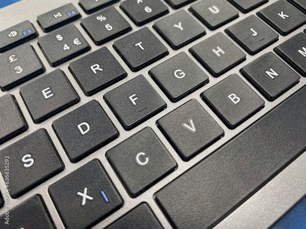 Close-up photo of a computer keyboard Close-up photo of a computer keyboard