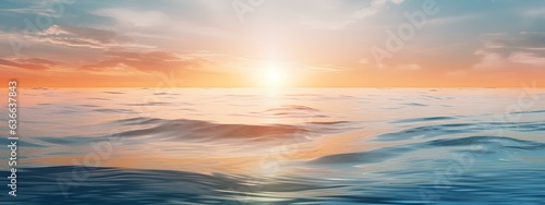 A blurry image, a banner, the sun rising over the sea in the style of a bokeh panorama.