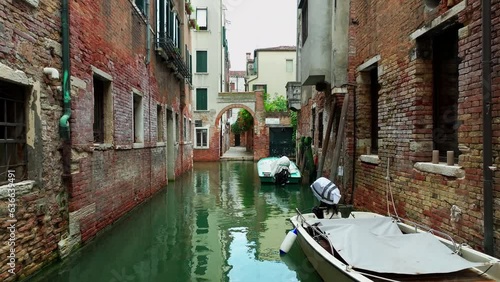 Boats in Venice canals, Italy (ID: 636639491)
