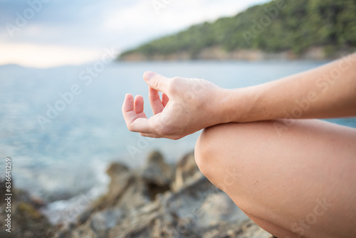 Meditation wellness on beach. Happy zen girl, spiritual fitness breathing and health for mindfulness reiki energy or relax pilates exercise workout in nature 