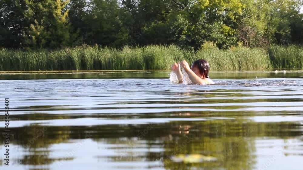 Drowning in the water and asking for help. A signal for help. Hope for salvation Drowning in the water and asking for help. A signal for help. Hope for salvation