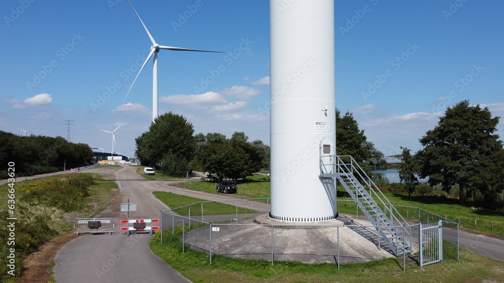 Windmill for green energy, wind turbine with blades that rotate on wind power and store in battery or accumulator to provide electricity to households. Windmill for green energy, wind turbine with blades that rotate on wind power and store in battery or accumulator to provide electricity to households.