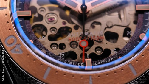 gear drive motion in skeleton watch. Mechanical watches with gears and cogs. Watch or clock mechanism. Clockwork details and parts. Inside watch, mechanical watch in macro view. Macro Shot Clock Face