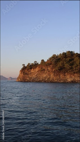 Beautiful landscape on the beach of mediterranean sea with mountains on background