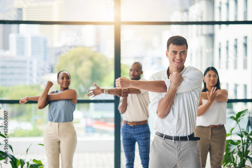 Workout, stretching and a group of business people in the office to exercise for health or mobility together. Fitness, wellness and coach training an employee team in the workplace for a warm up