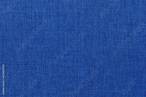 Dark blue linen fabric texture background, seamless pattern of natural textile.