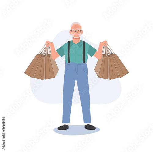 Happy Grandpa Holding Shopping Bags. Elderly man Enjoying Shopping with Shopping Bags. Senior Lifestyle and Retail Therapy