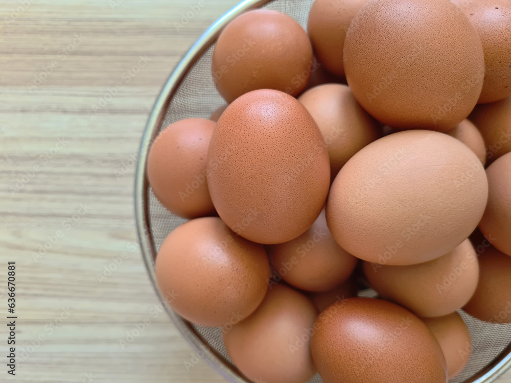 Fresh eggs in stainless steel basket Fresh eggs in stainless steel basket