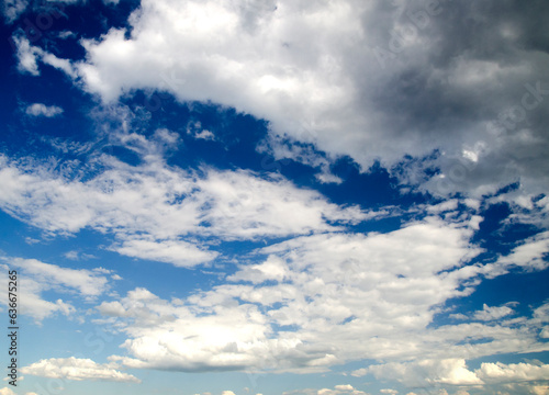 Clouds in deep blue summer sky © Studio-M