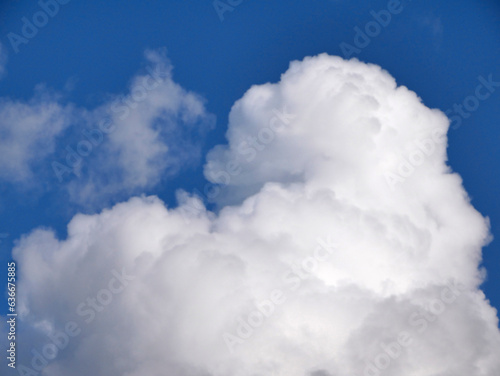 White fluffy cloud over blue sky background, beautiful heaven photo