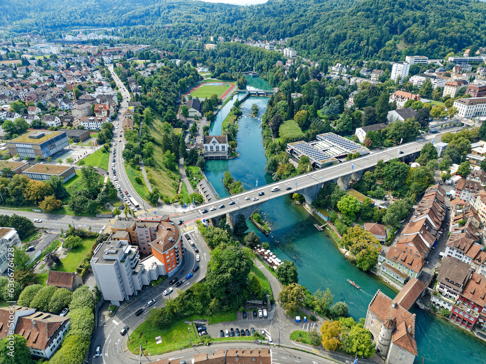 Aerial view of Swiss City of Baden with Limmat River, old town and bridge on a sunny summer noon. Photo taken August 19th, 2023, Baden, Canton Aargau, Switzerland.
