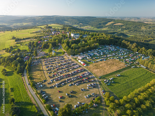 Aerial view of the field parking for cars and buses during the Great Indulgence of the Assumption of the Blessed Virgin Mary festival, Kalwaria Paclawska, Subcarpathian, Poland