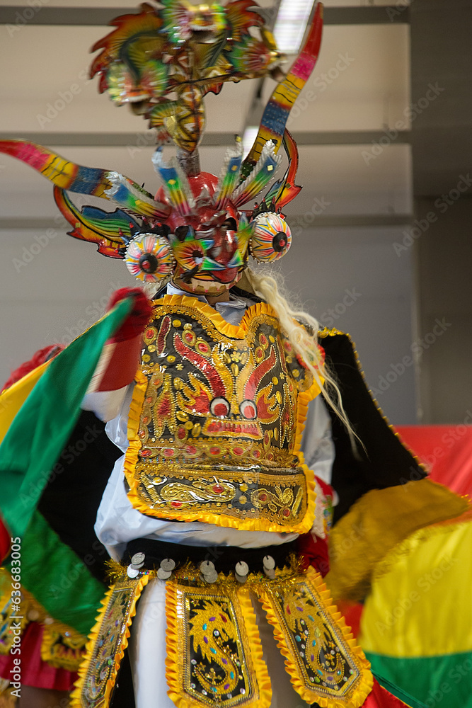 man dressed as the devil dancing  a traditional dance 