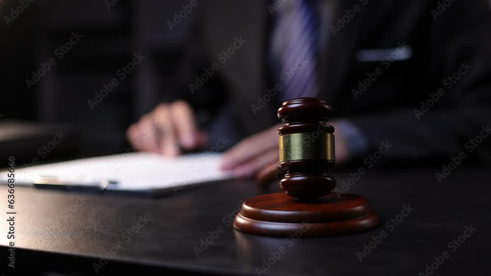 Lawyer working on paperwork in the office. Legal justice concept. Lawyer working on paperwork in the office. Legal justice concept.