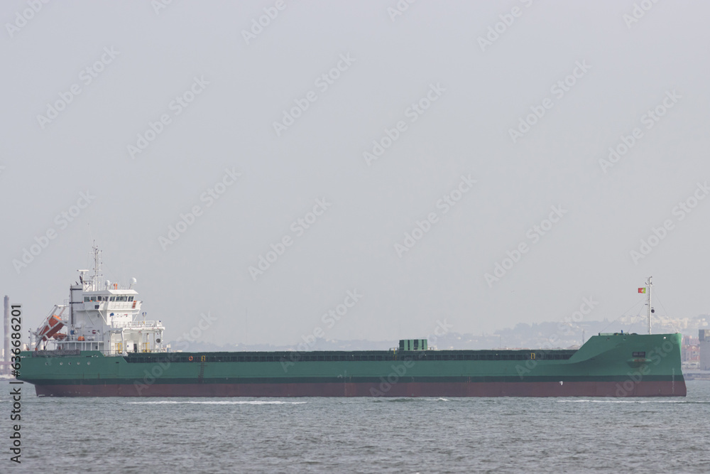 A large industrial barge in a Portuguese river A large industrial barge in a Portuguese river