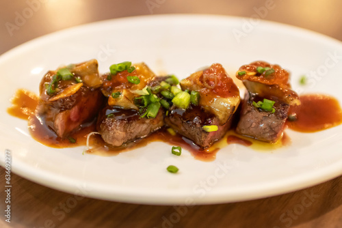 Tournedos Rossini recipe with foie gras on top of the steak. 